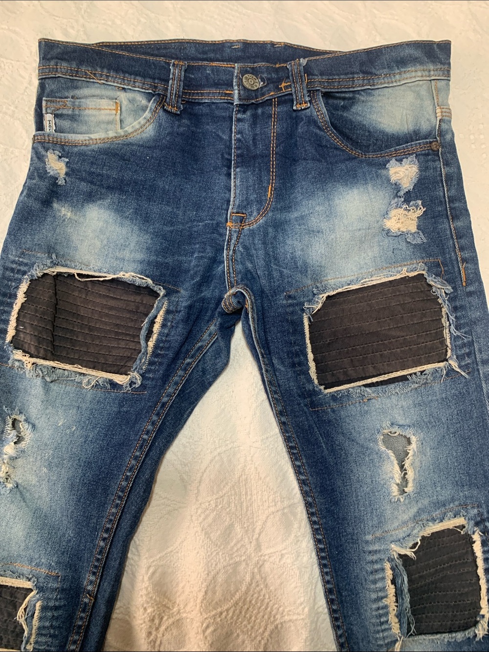 Torer Denim Collection Distressed Jeans in Faded Blue Wash